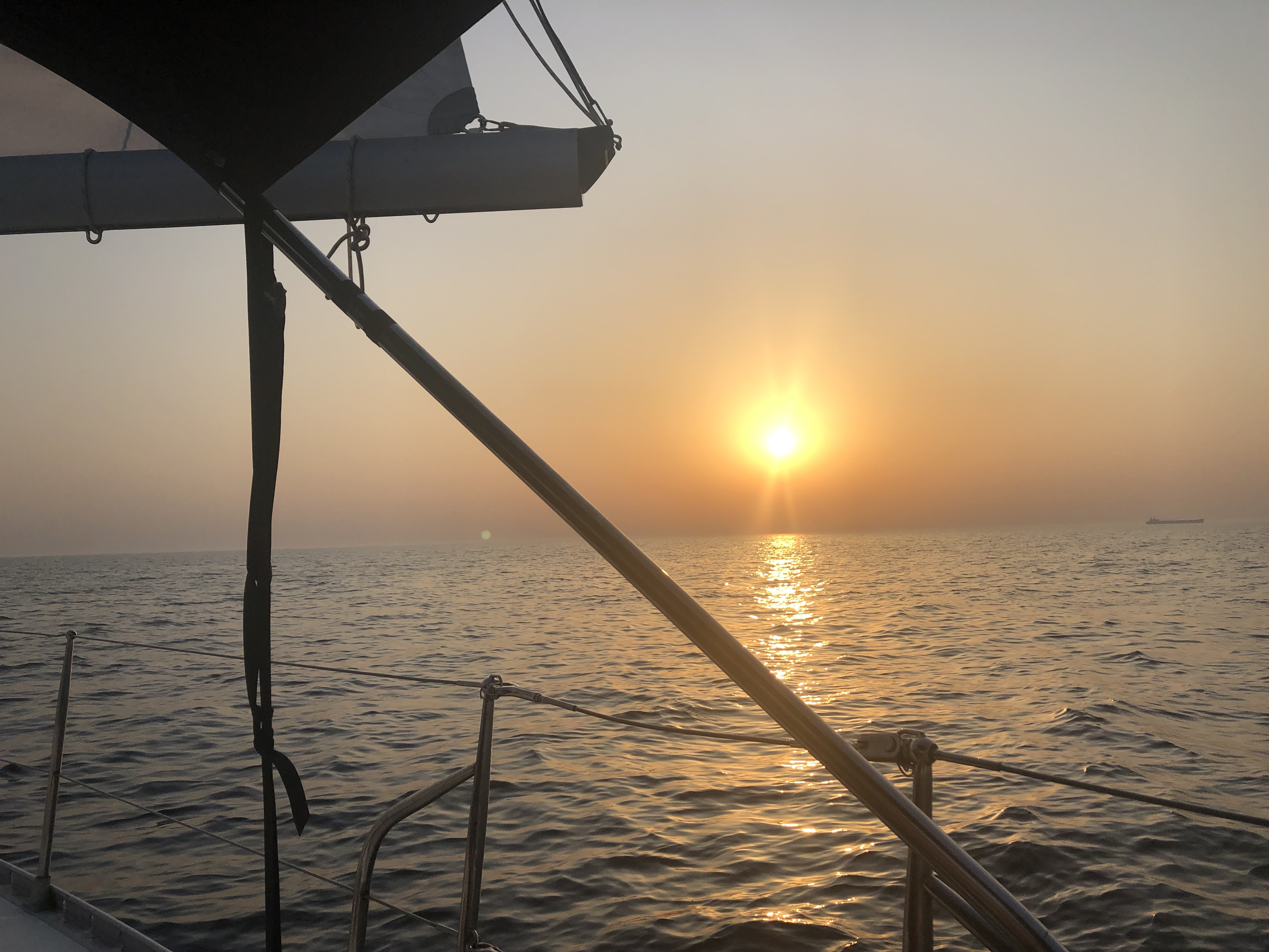 Zeilen varen rond de wereld reizen vertrekken foto boot zon water zee Noordzee 